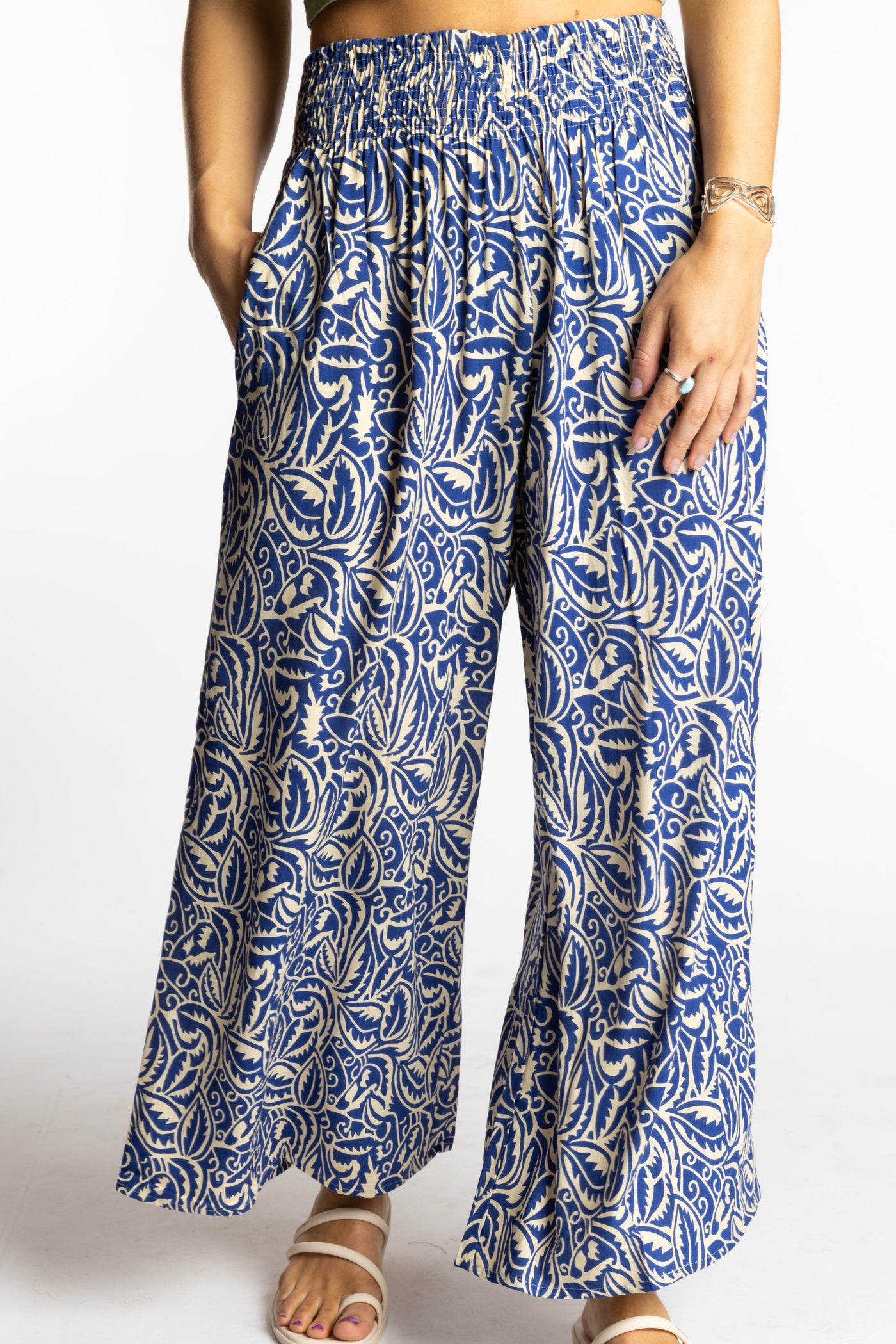Sophie is wearing the S/M Blue Azure Canopy Printed Penny Lane Pants