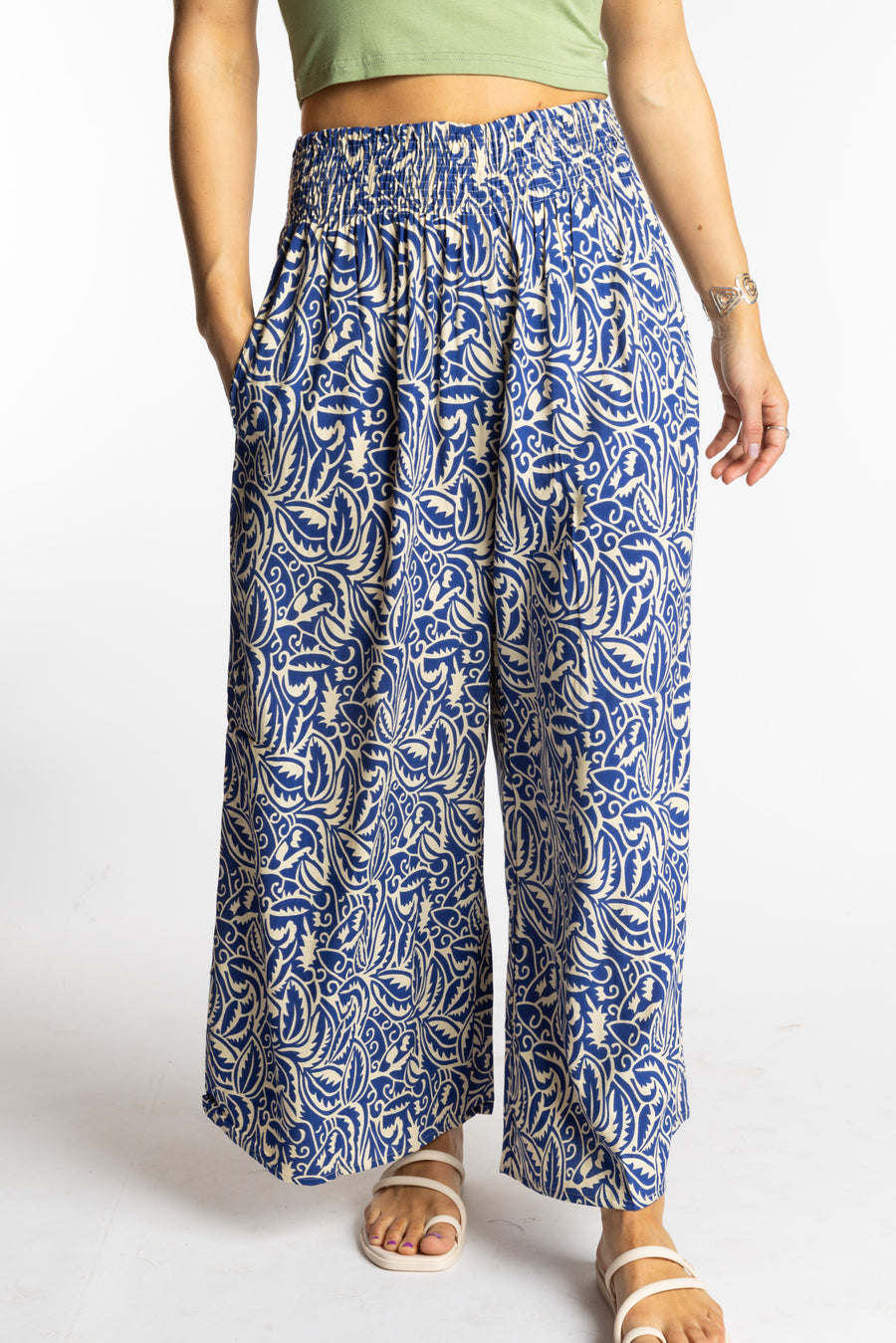 Sophie is wearing the S/M Blue Azure Canopy Printed Penny Lane Pants