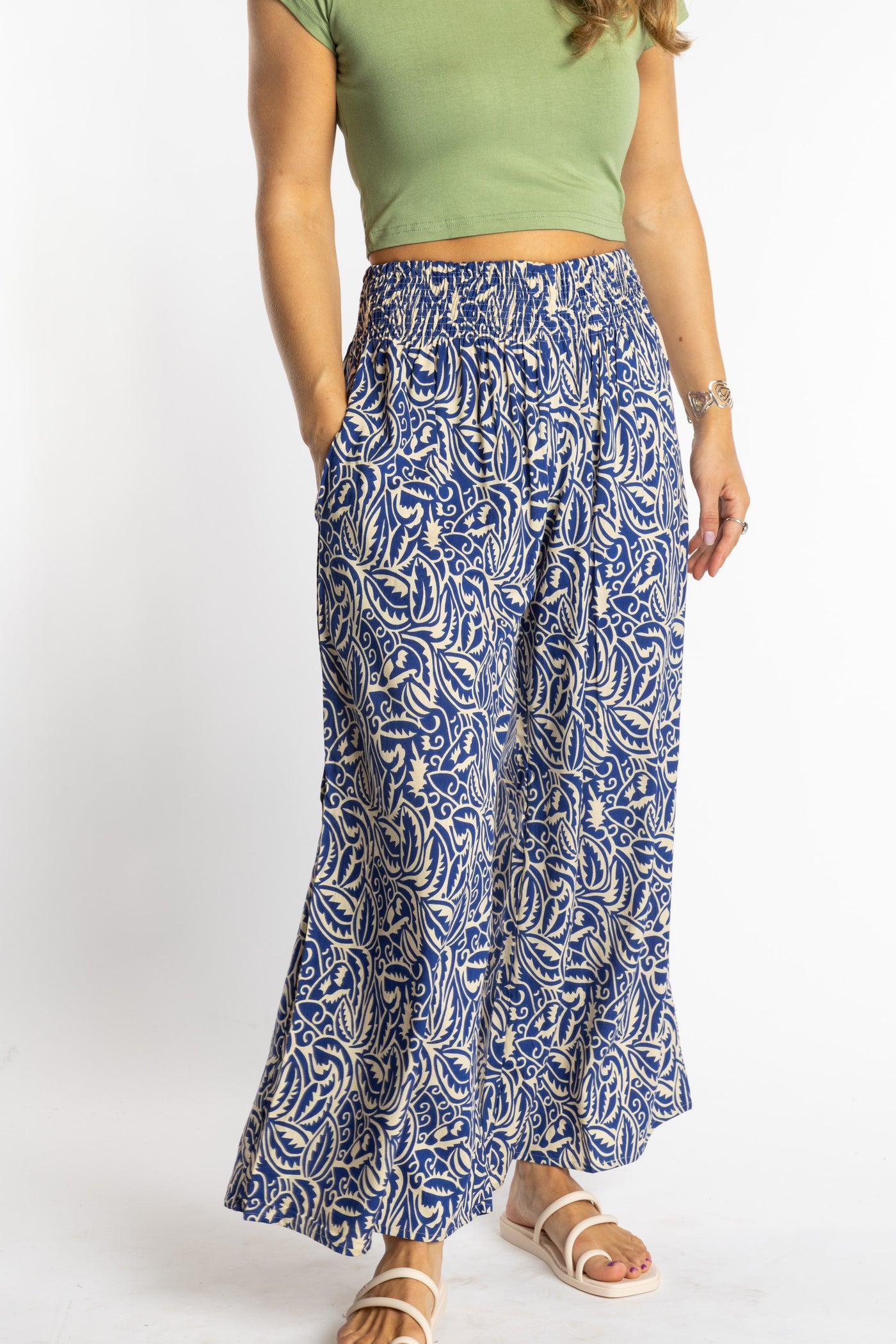 Sophie is wearing the S/M Blue Azure Canopy Printed Penny Lane Pants
