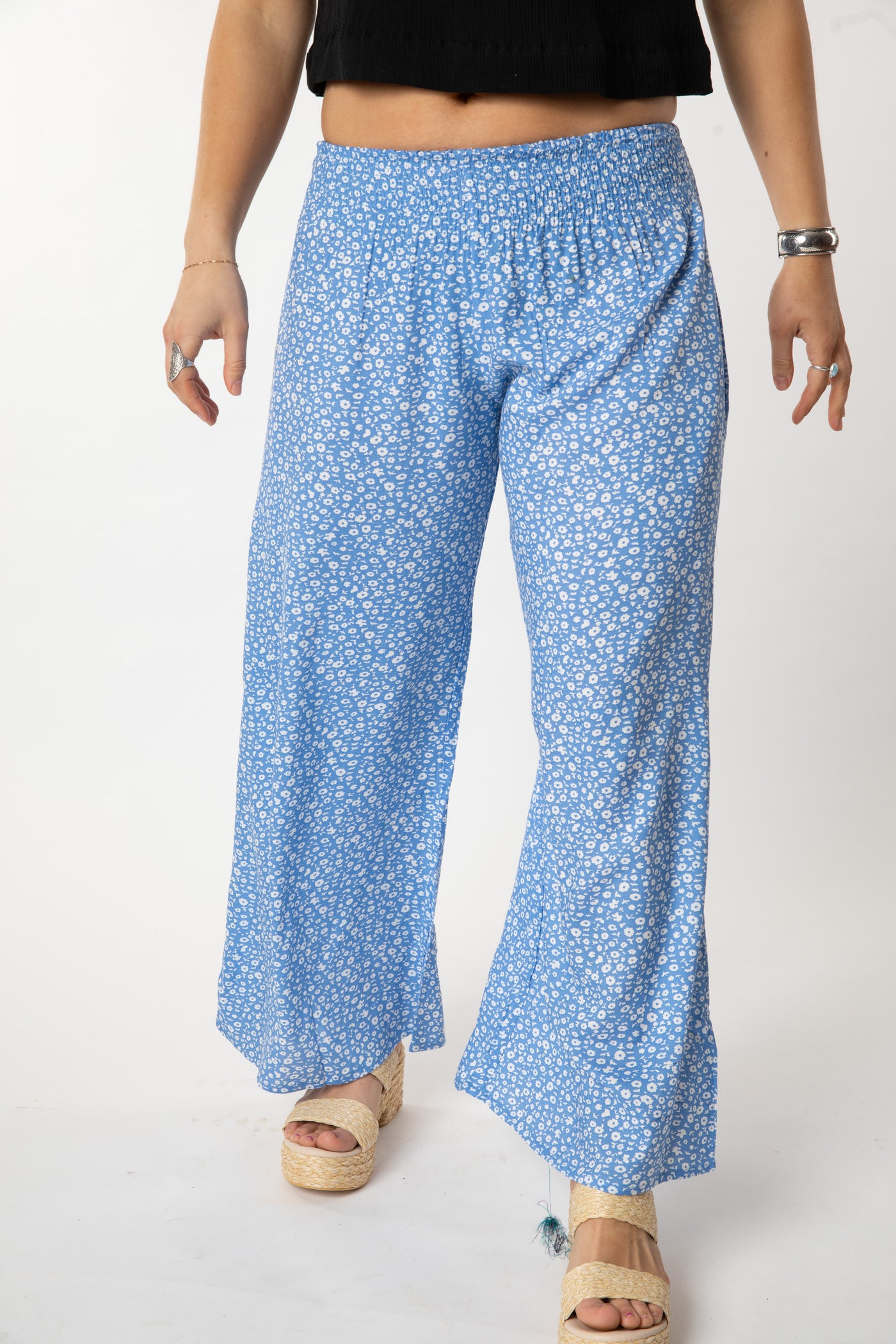 Sophie is wearing size S/M wide leg pants in sky blue floret