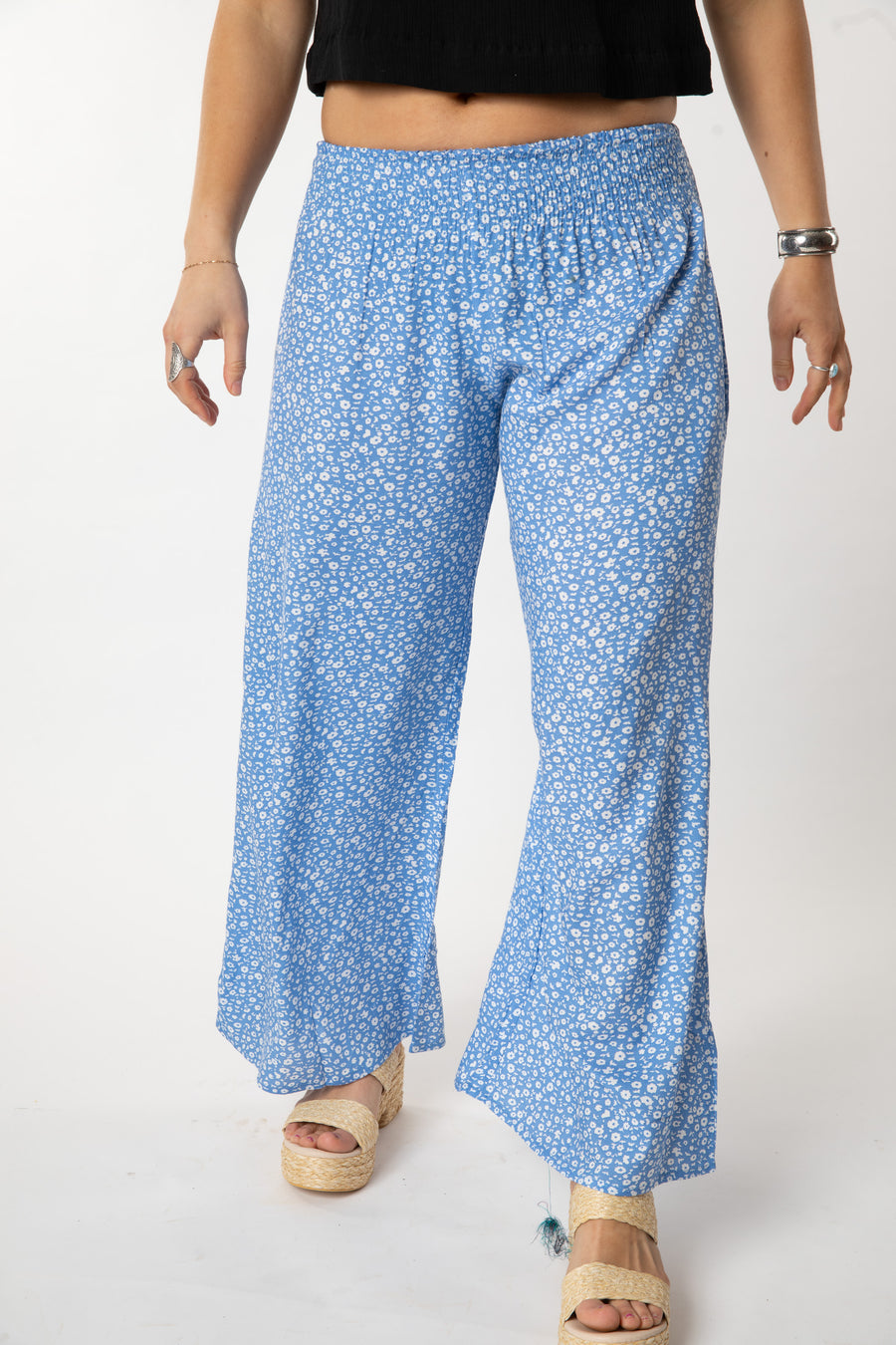 Sophie is wearing size S/M wide leg pants in sky blue floret
