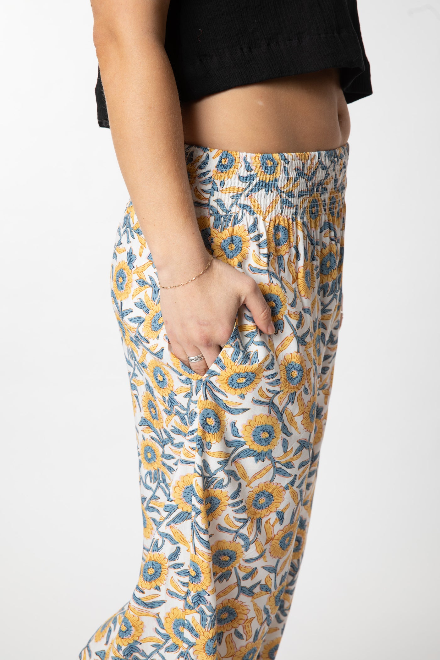 Sophie is wearing size S/M wide leg pants in sunflower