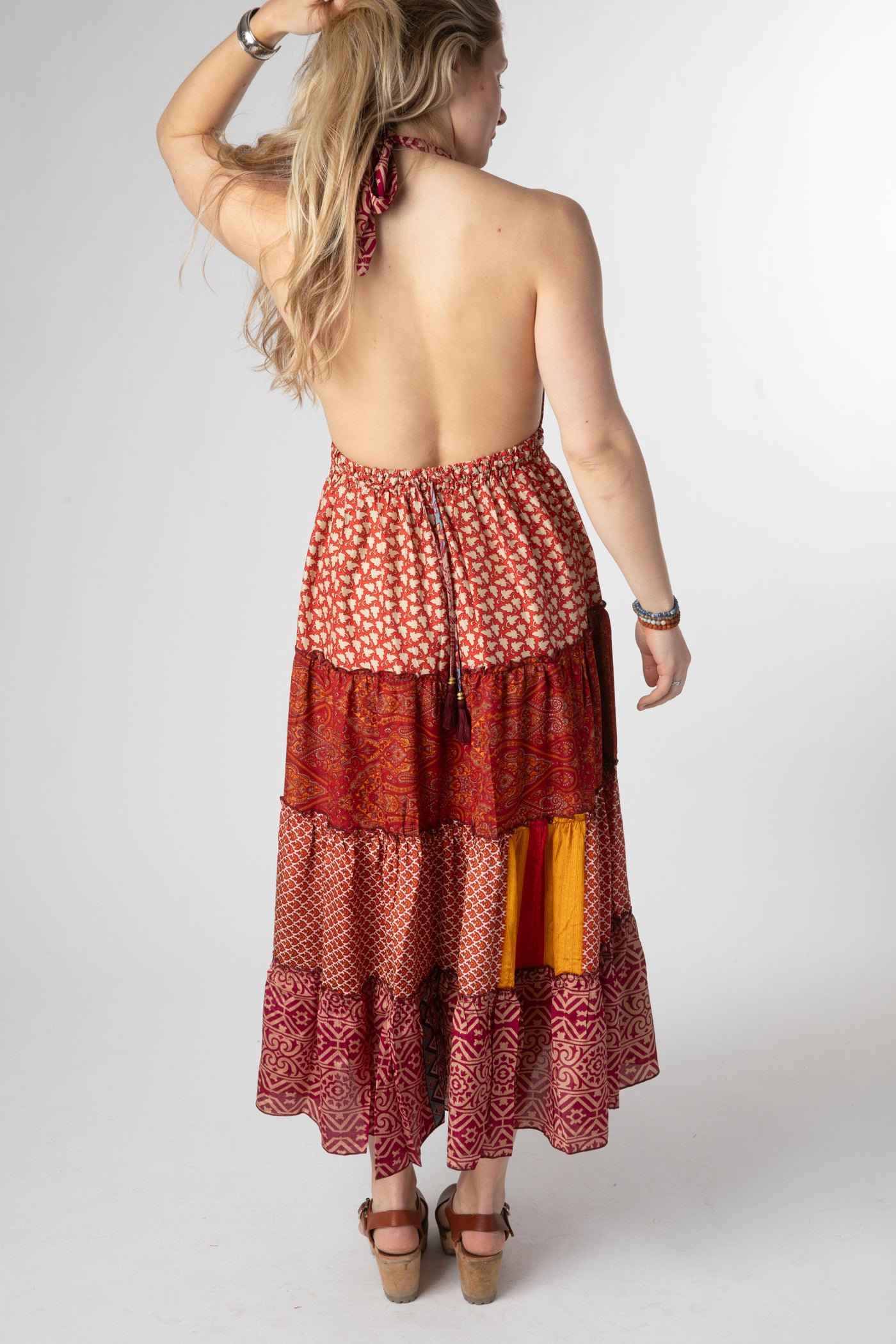Sophie is wearing size S/M patchwork halter dress in fire on the mountain