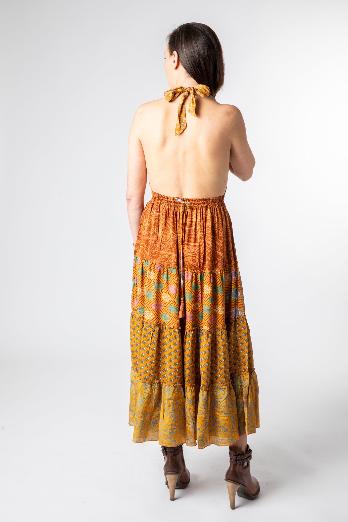 Emily is wearing size S/M patchwork halter dress in fire on the mountain