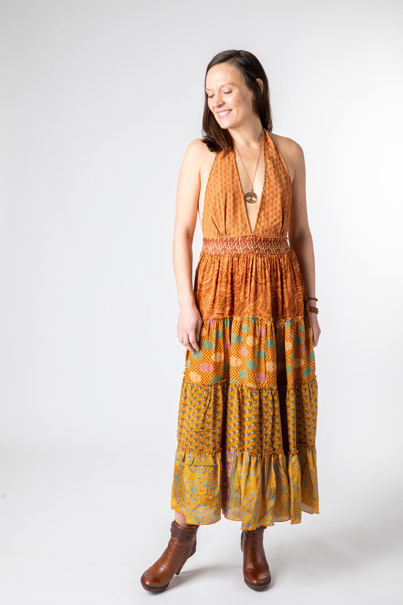 Emily is wearing size S/M patchwork halter dress in fire on the mountain