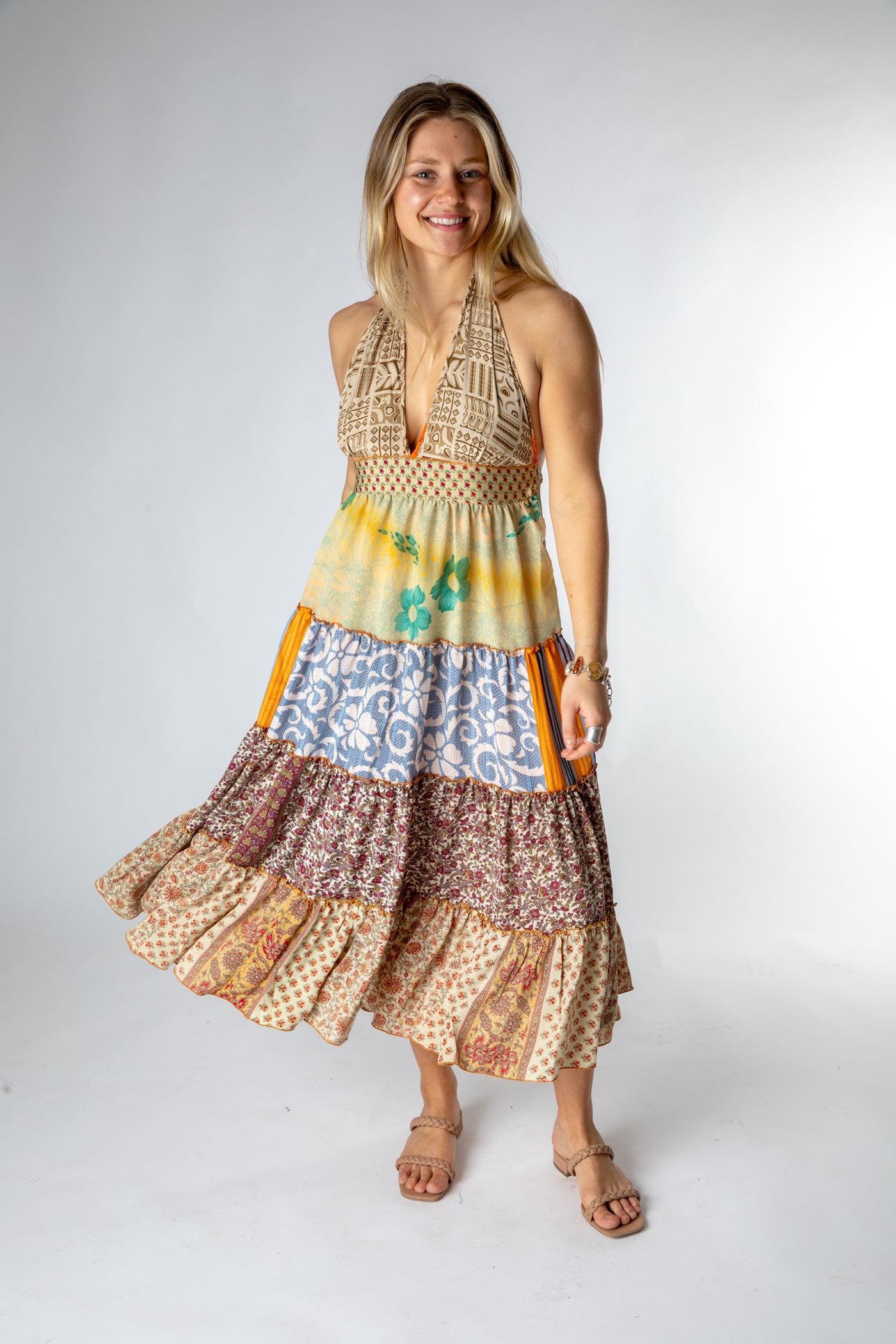 Sophie is wearing size S/M patchwork halter dress in jack straw