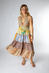 Sophie is wearing size S/M patchwork halter dress in jack straw