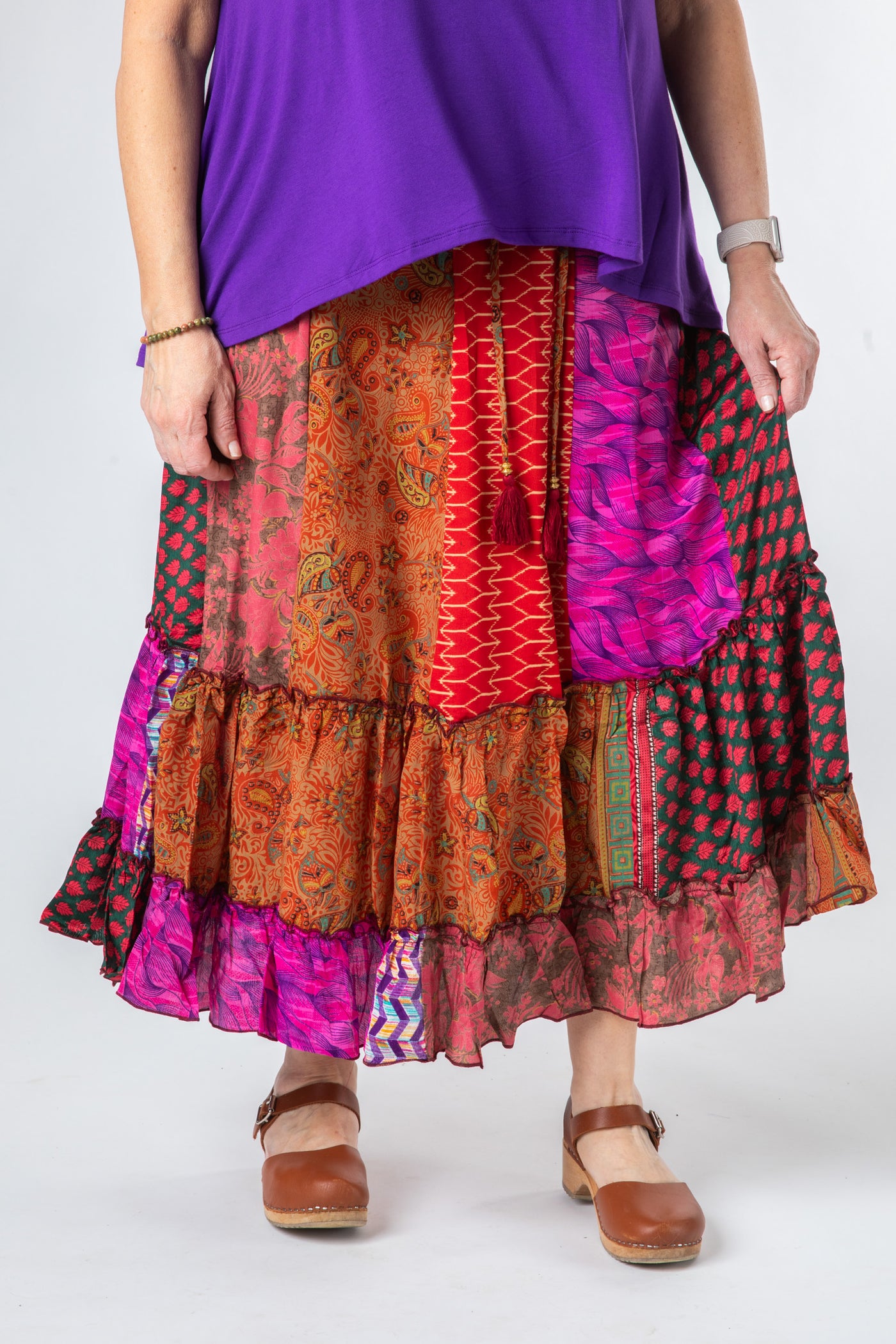 Betty is wearing a silk prairie skirt in dark star