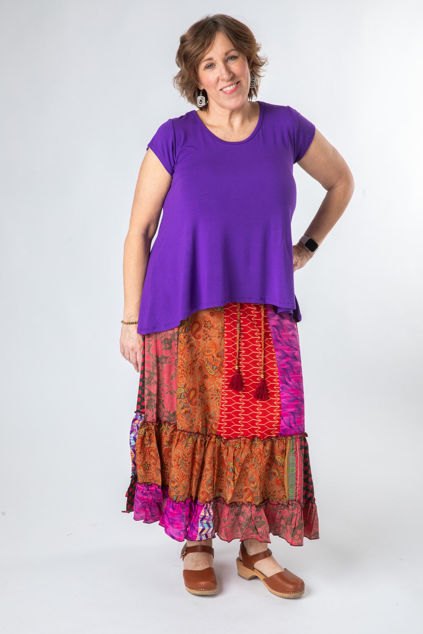 Betty is wearing a silk prairie skirt in dark star