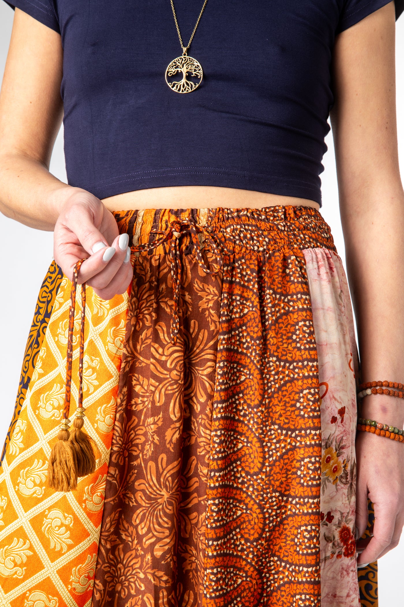 Emily is wearing a silk prairie skirt in fire on the mountain