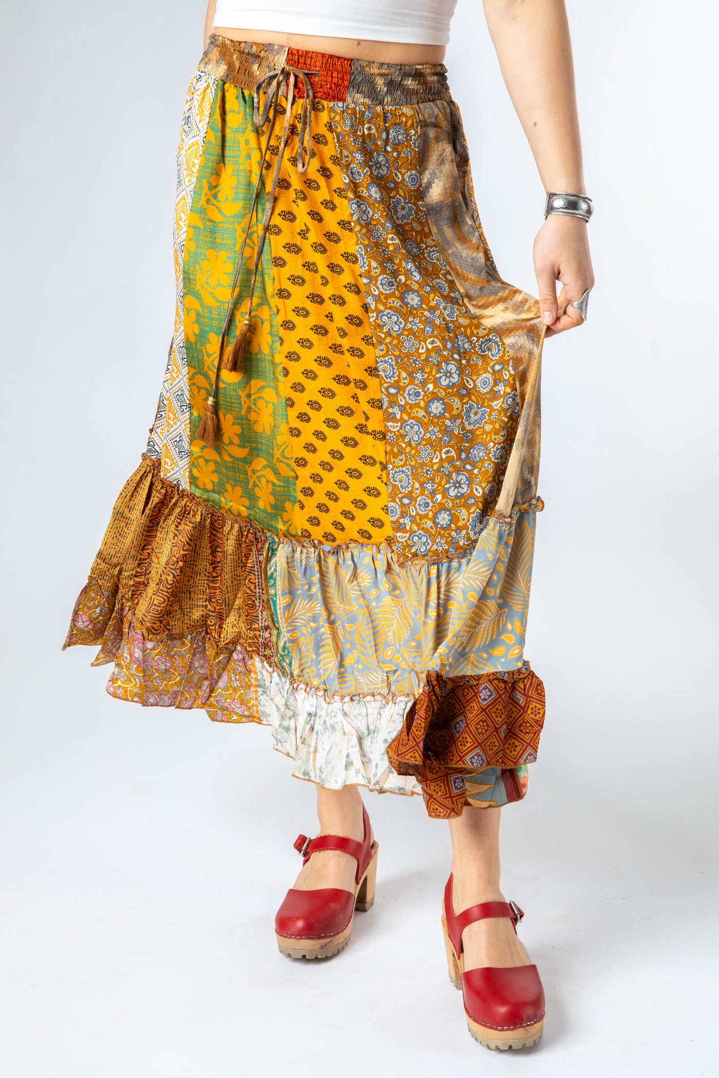 Sophie is wearing a silk prairie skirt in jack straw