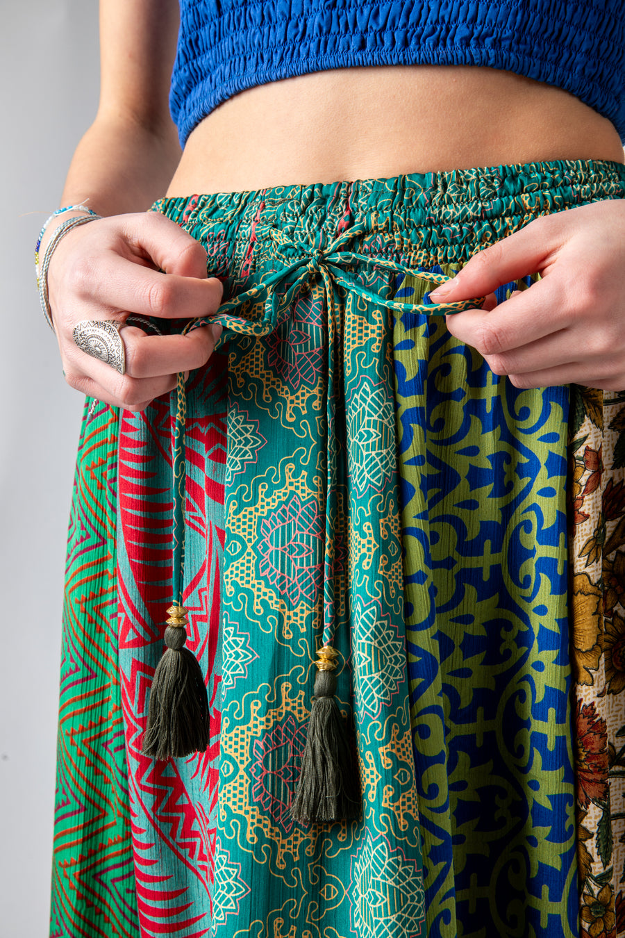 Colette is wearing a silk prairie skirt in morning dew
