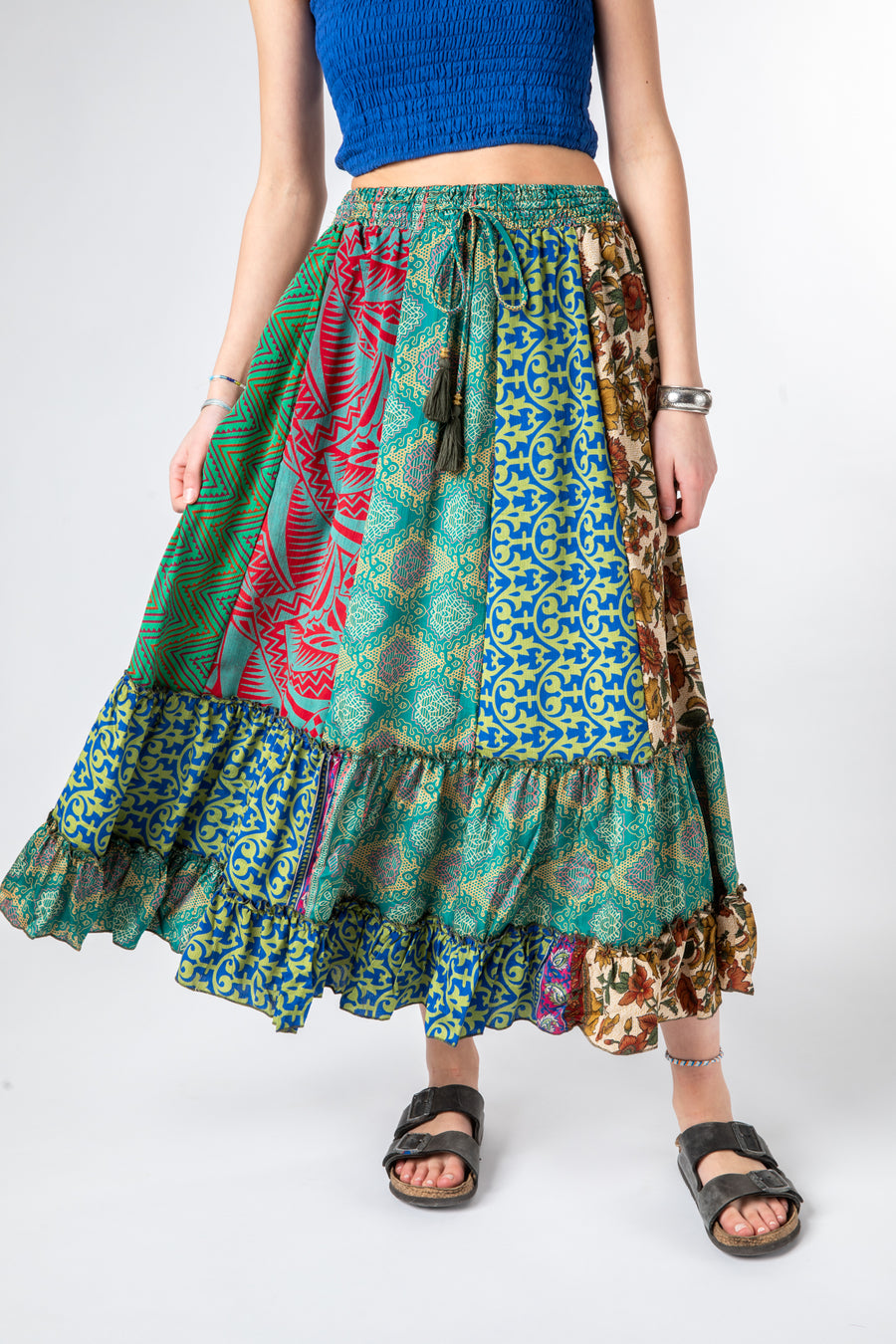 Colette is wearing a silk prairie skirt in morning dew