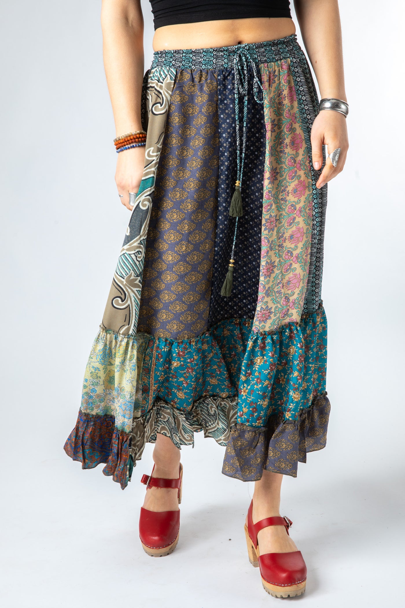 Sophie is wearing a silk prairie skirt in shakedown street
