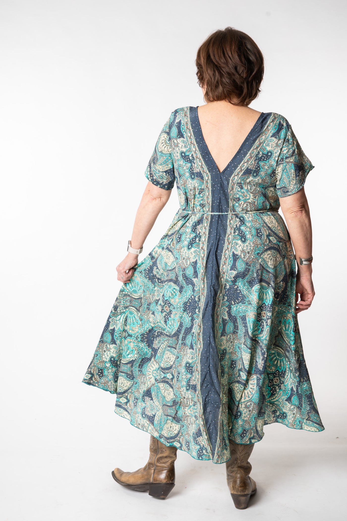 Betty is wearing a flowy dress in blue dream