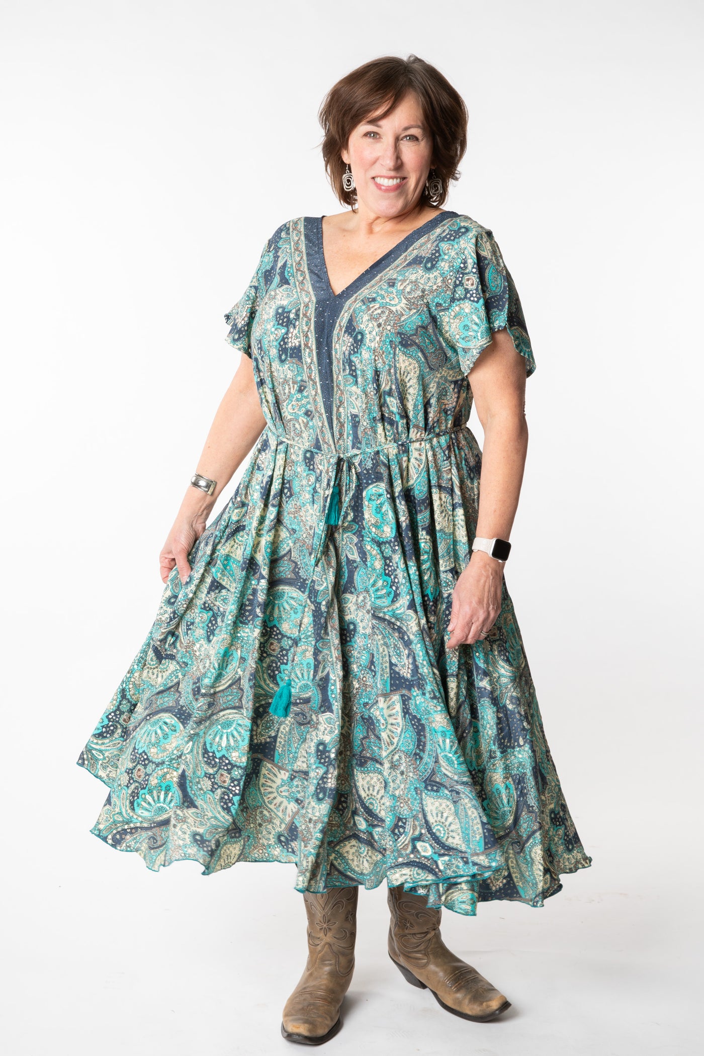 Betty is wearing a flowy dress in blue dream