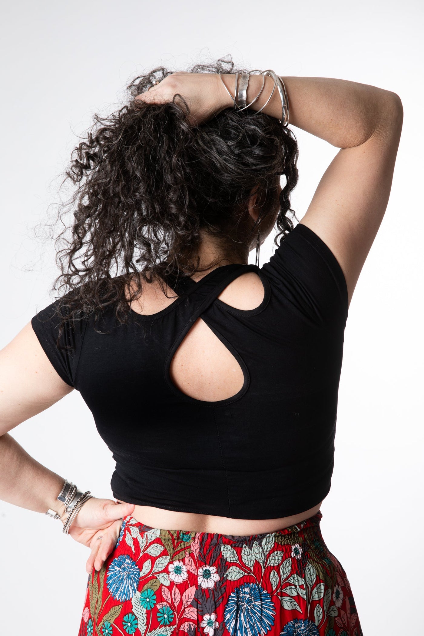 Susan is wearing size M cross back crop top in black