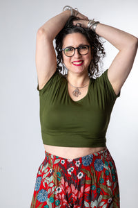 Susan is wearing size M cross back crop top in green