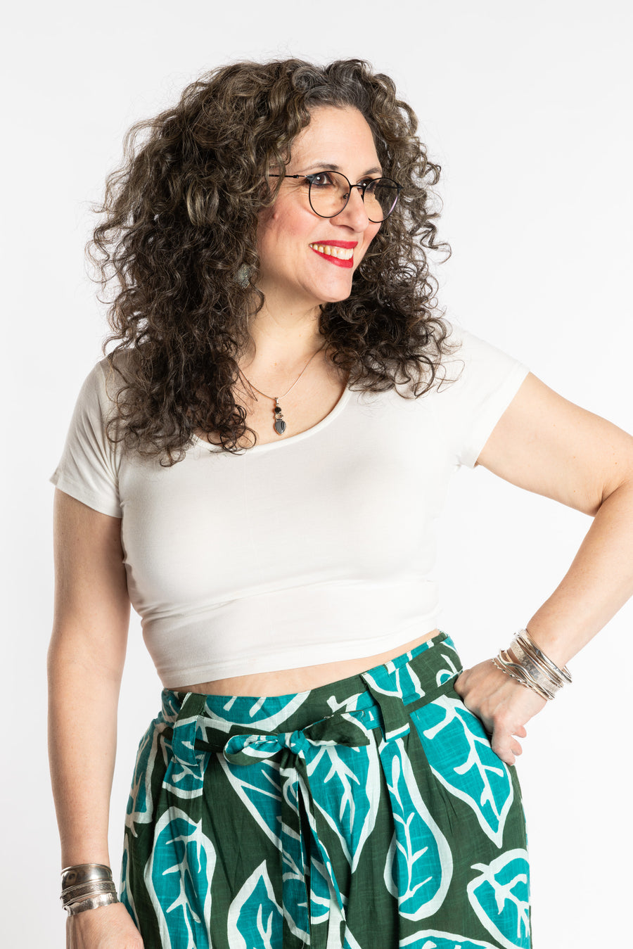 Susan is wearing the M/L white cross back crop top