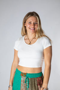 Sophie is wearing size M cross back crop top in white
