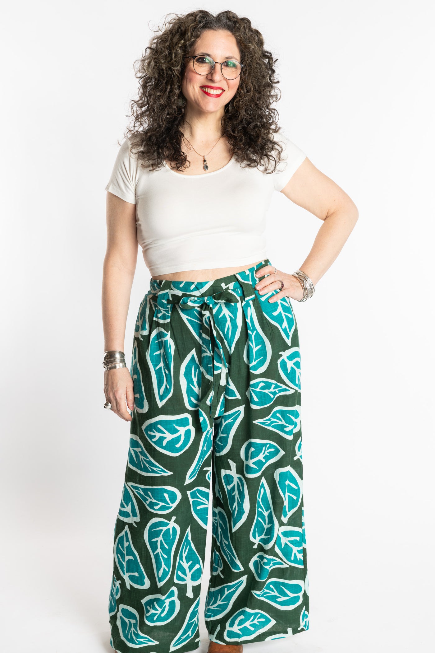 Susan is wearing the M/L white cross back crop top