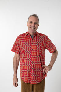 Ross is wearing size M printed cotton button up shirt in red geo