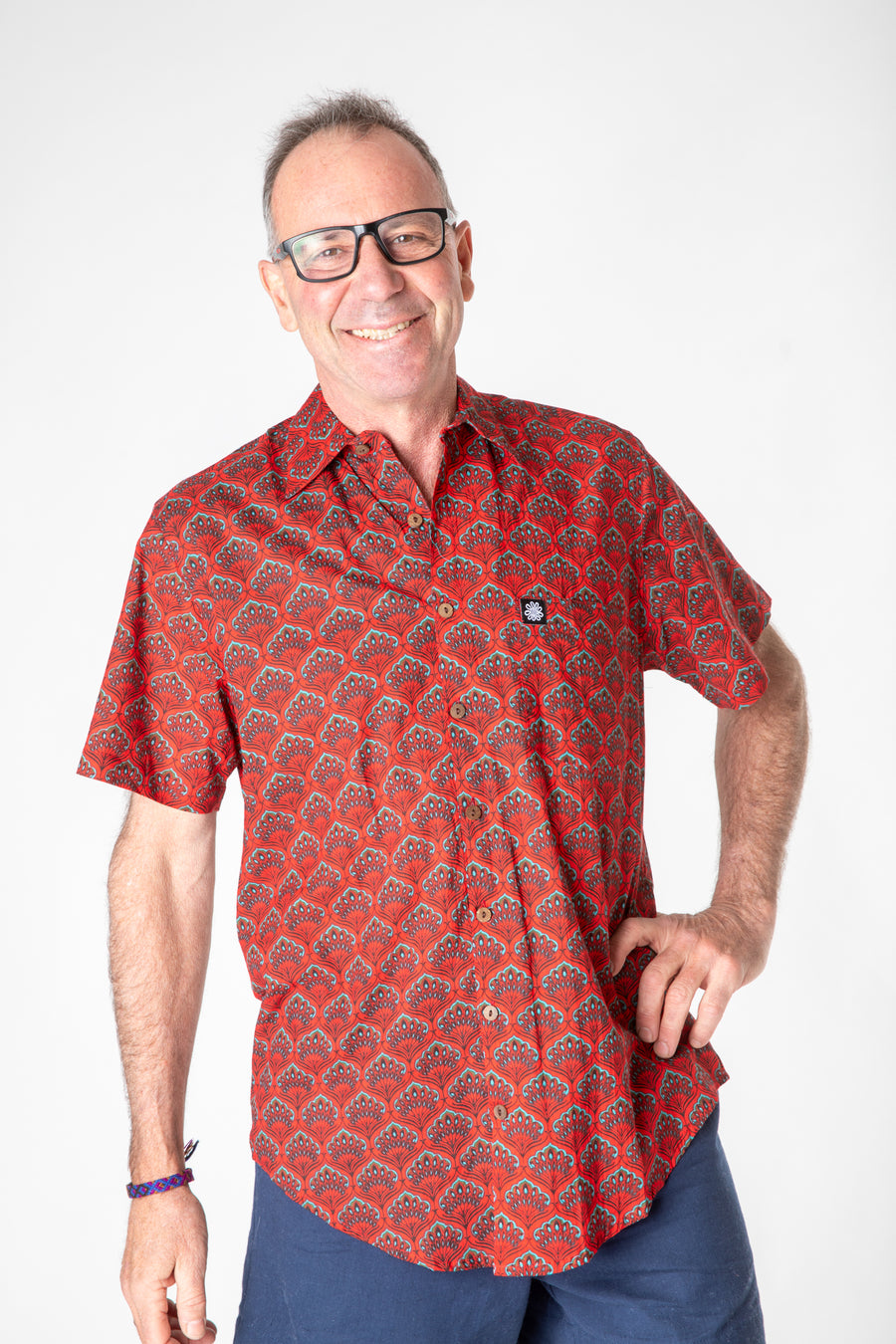 Ross is wearing size M printed cotton button up shirt in red peacock