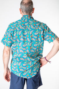 Ross is wearing size M printed cotton button up shirt in turquoise paisley