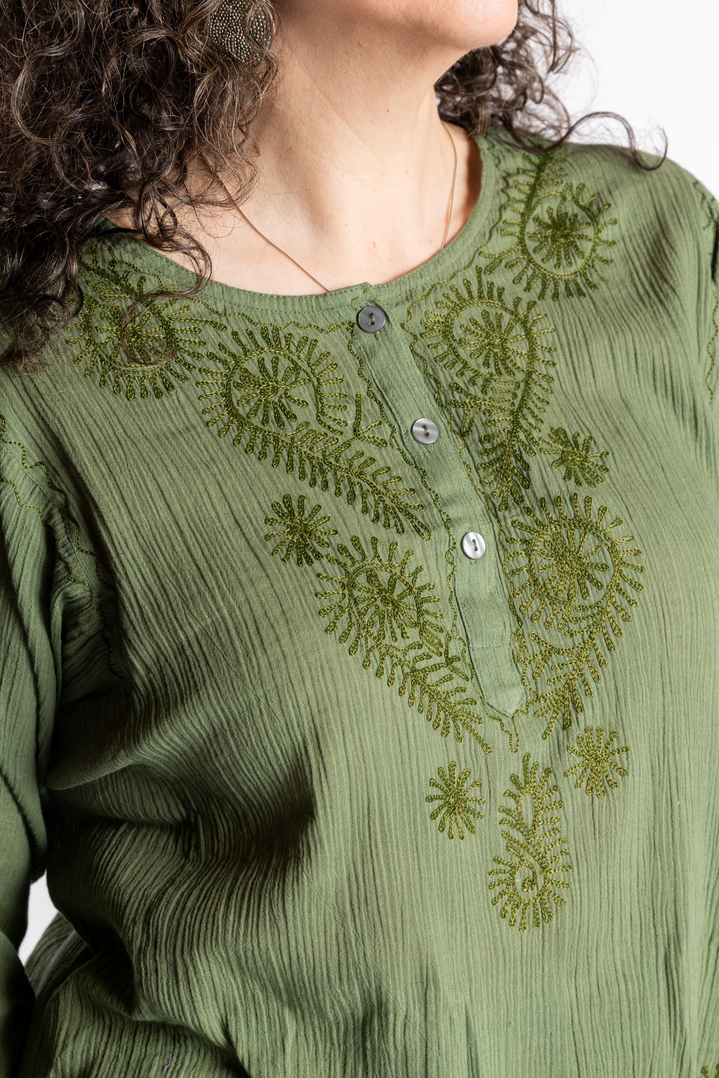 Susan is wearing the M Green Flowy Bohemian Womens Clothing Top