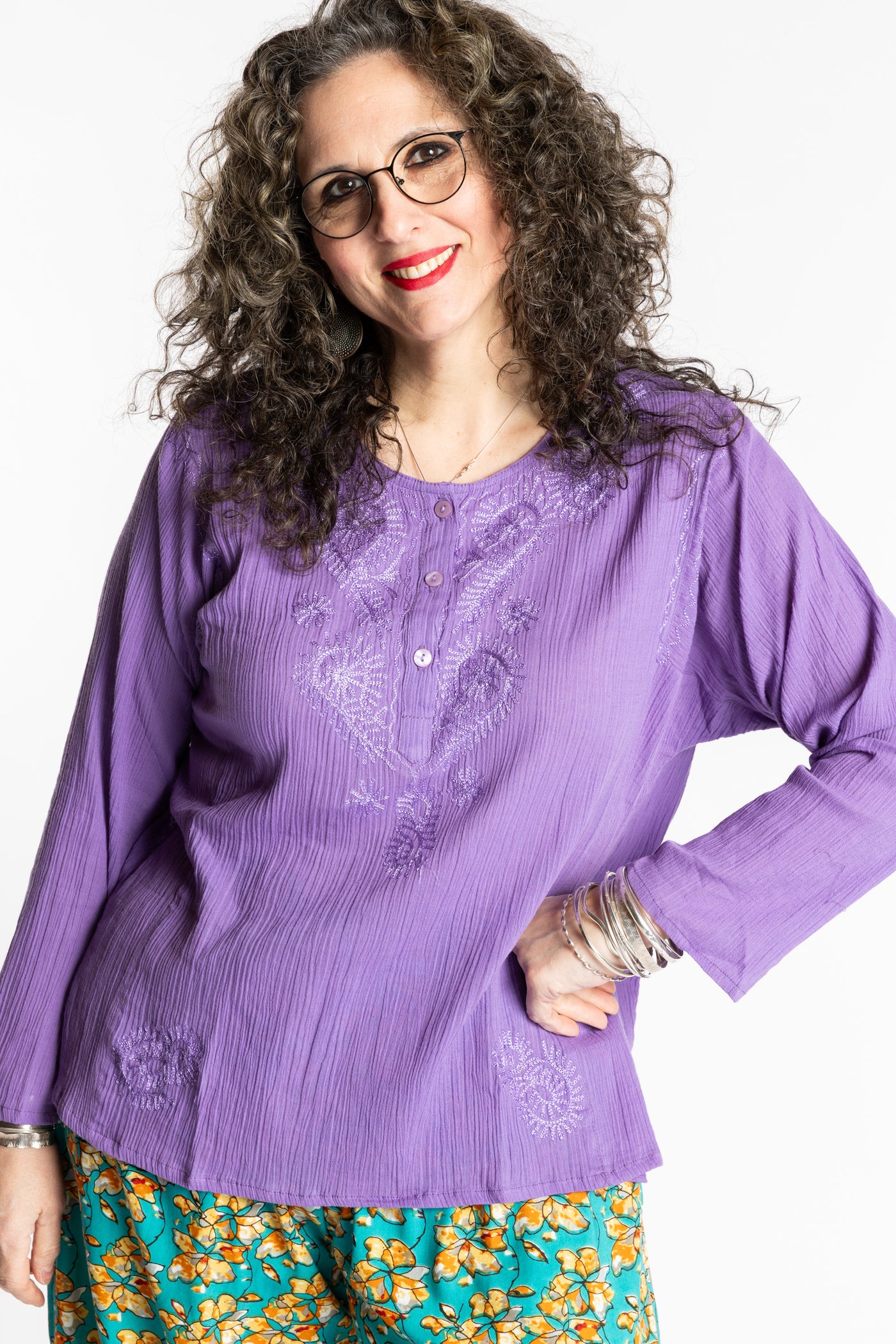 Susan is wearing the M Purple Flowy Bohemian Womens Clothing Top