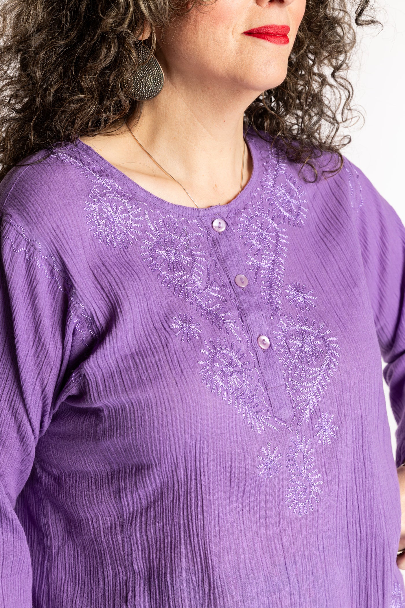 Susan is wearing the M Purple Flowy Bohemian Womens Clothing Top