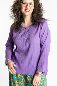 Susan is wearing the M Purple Flowy Bohemian Womens Clothing Top