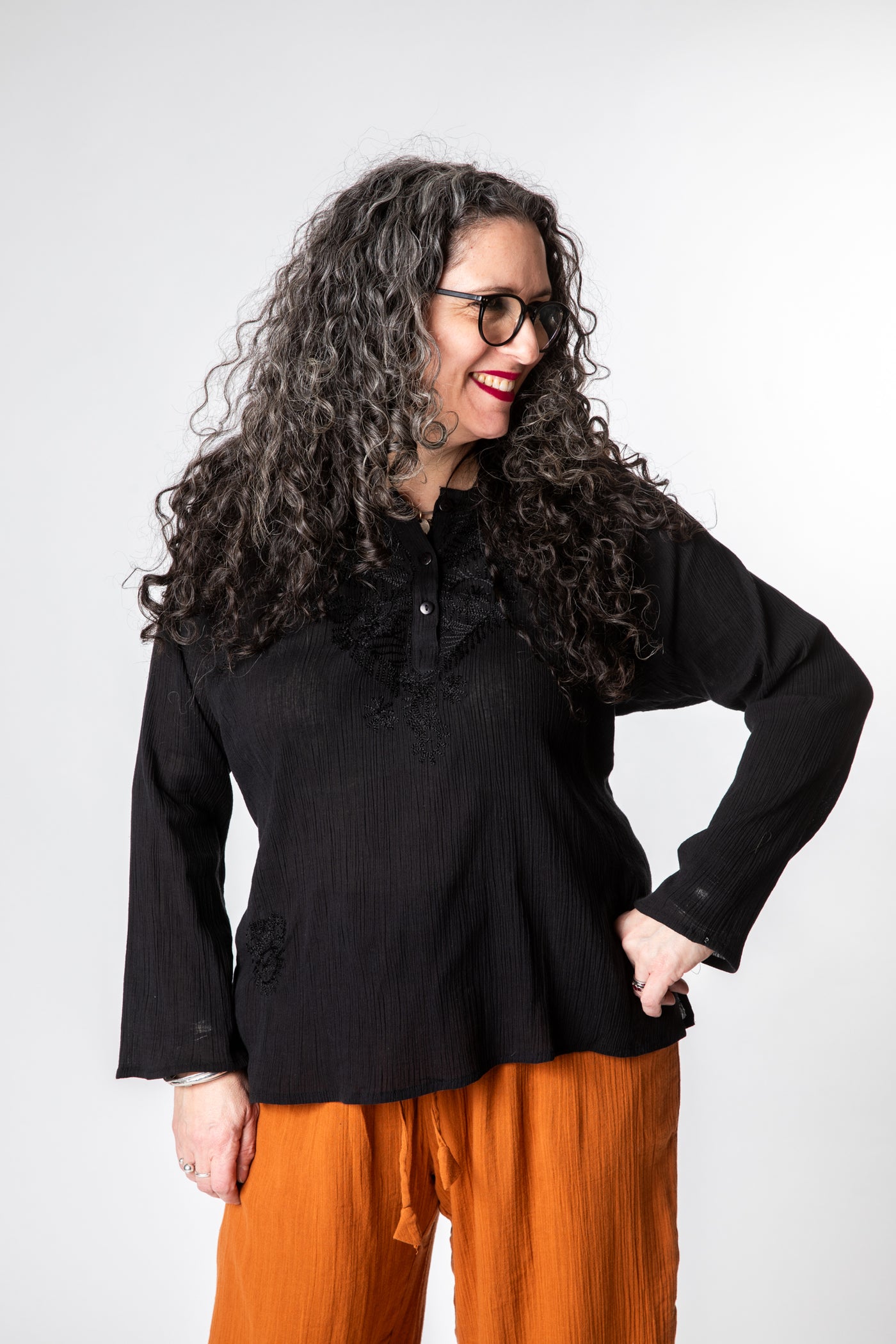 Susan is wearing size M cotton kurta in black