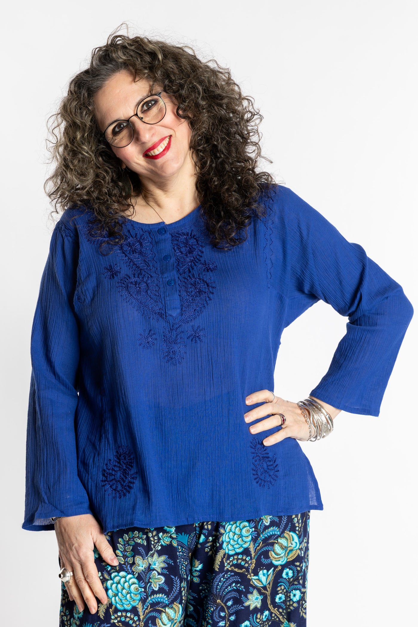 Susan is wearing the M Blue Flowy Bohemian Womens Clothing Top
