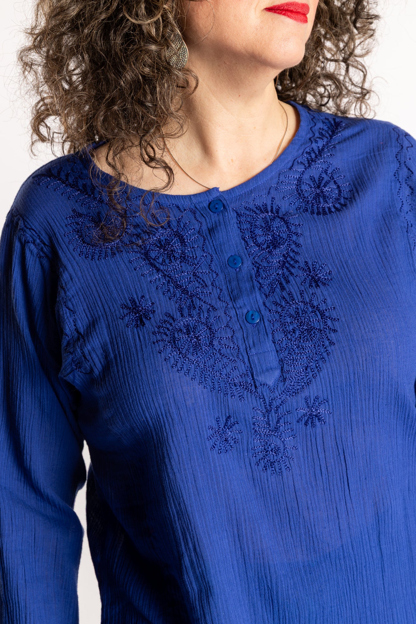Susan is wearing the M Blue Flowy Bohemian Womens Clothing Top