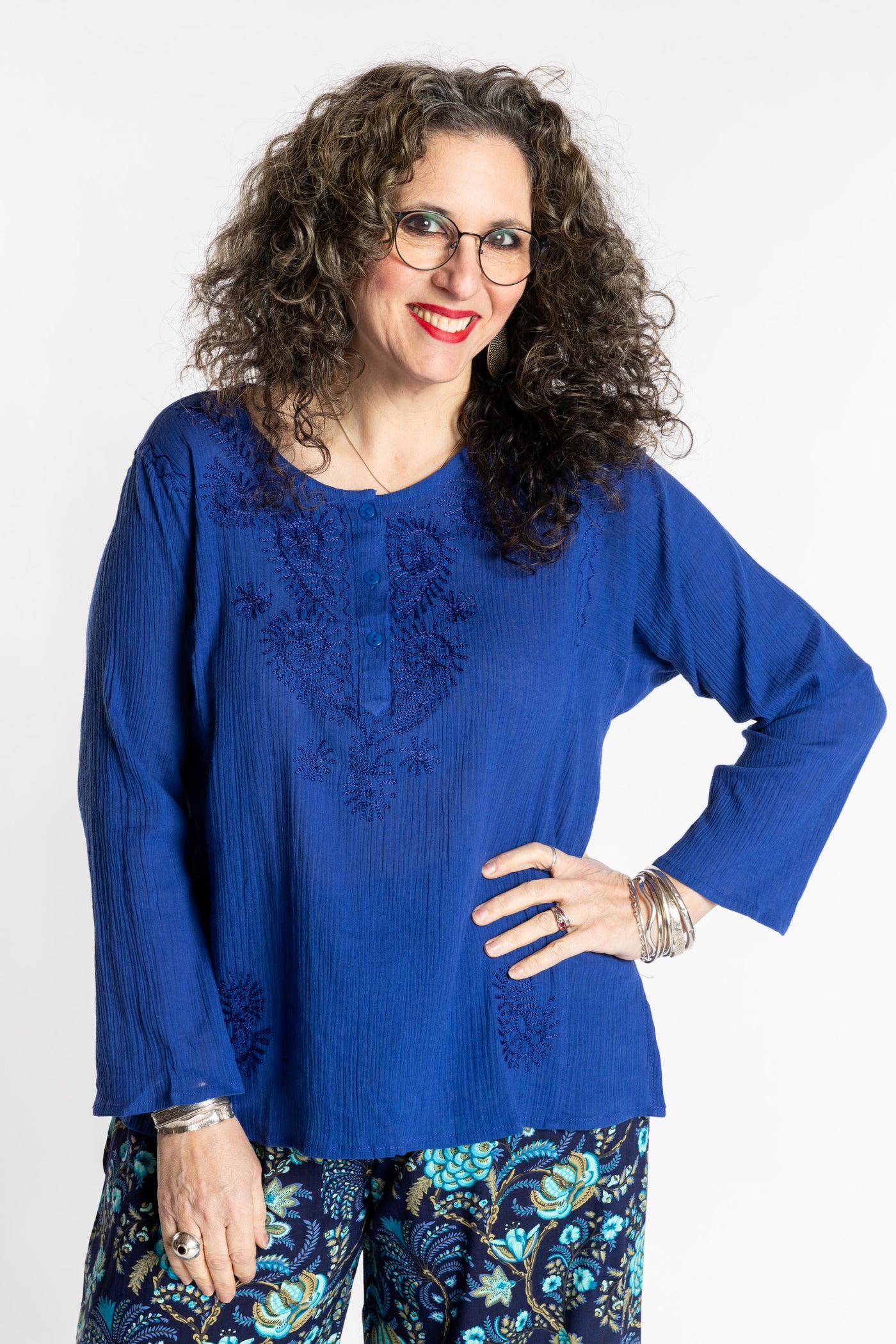 Susan is wearing the M Blue Flowy Bohemian Womens Clothing Top
