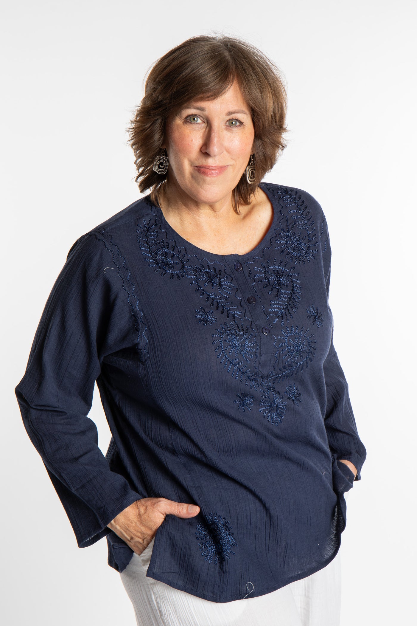 Betty is wearing a size L Navy embroidered Kurta top