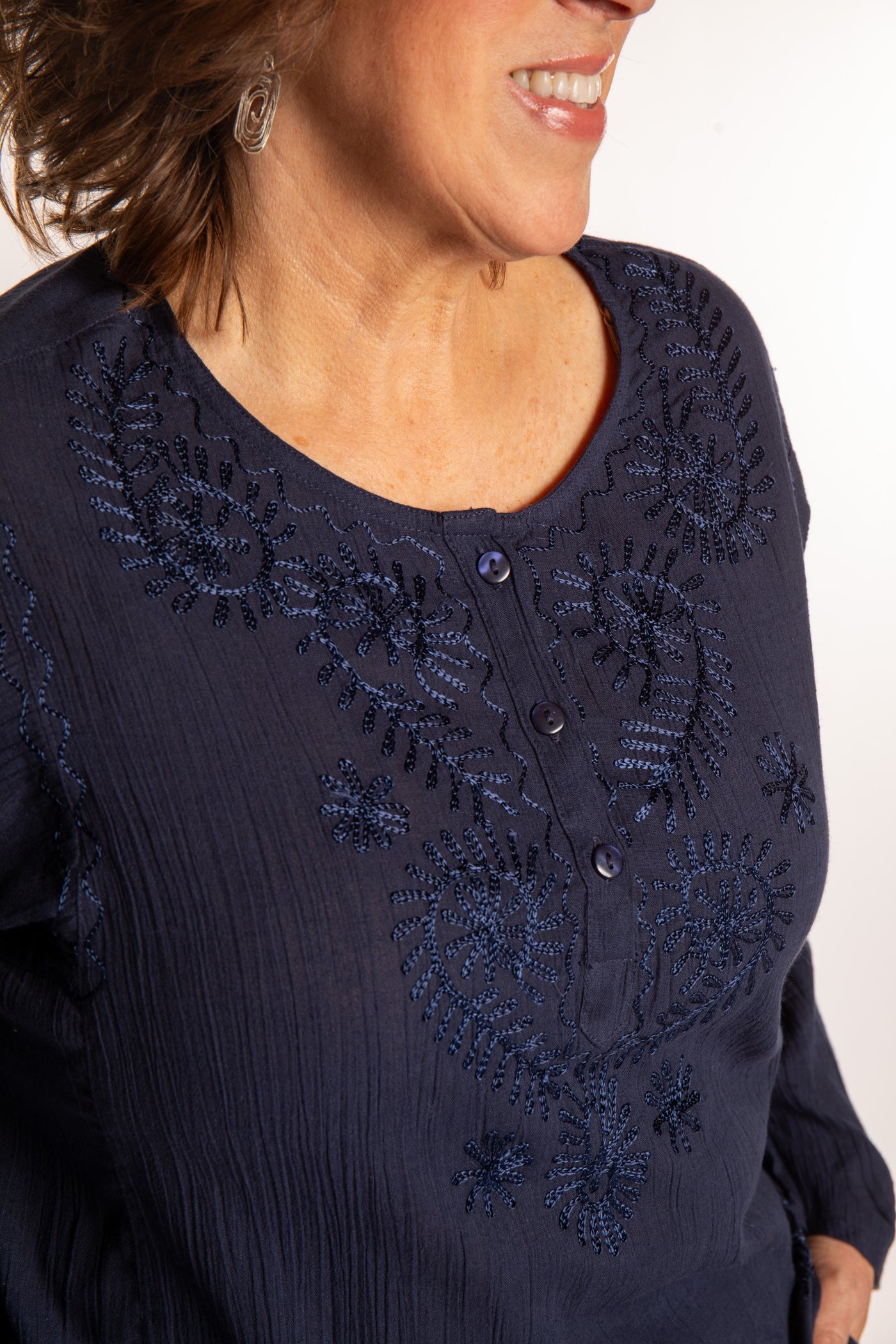 Betty is wearing a size L Navy embroidered Kurta top