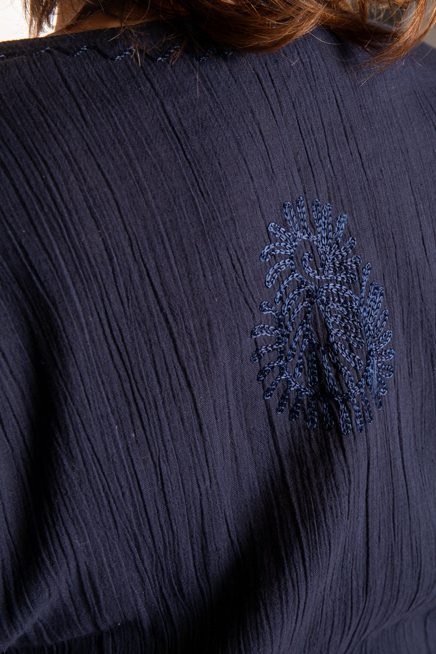 Betty is wearing a size L Navy embroidered Kurta top