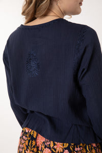 Jacalyn is wearing size S cotton kurta in navy