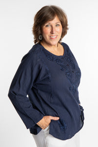 Betty is wearing a size L Navy embroidered Kurta top