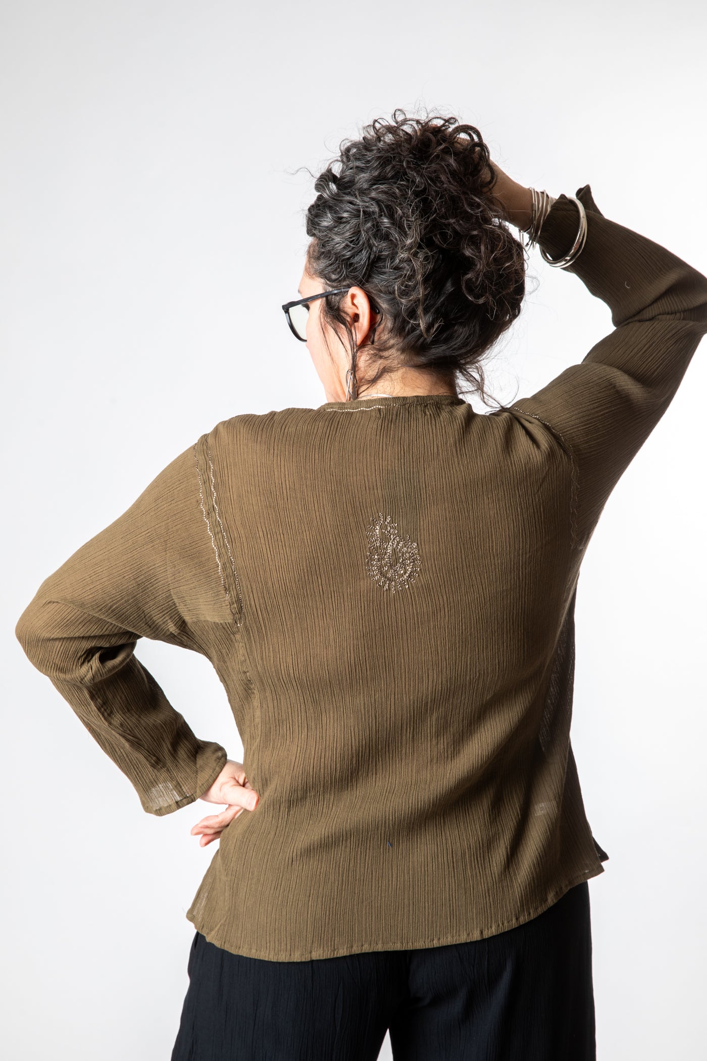 Susan is wearing size M cotton kurta in olive