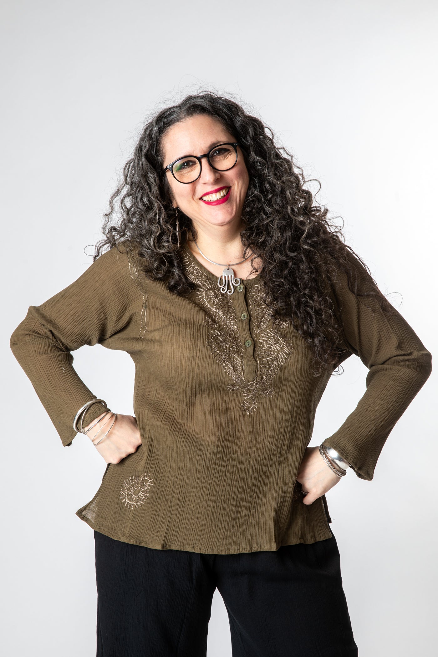 Susan is wearing size M cotton kurta in olive