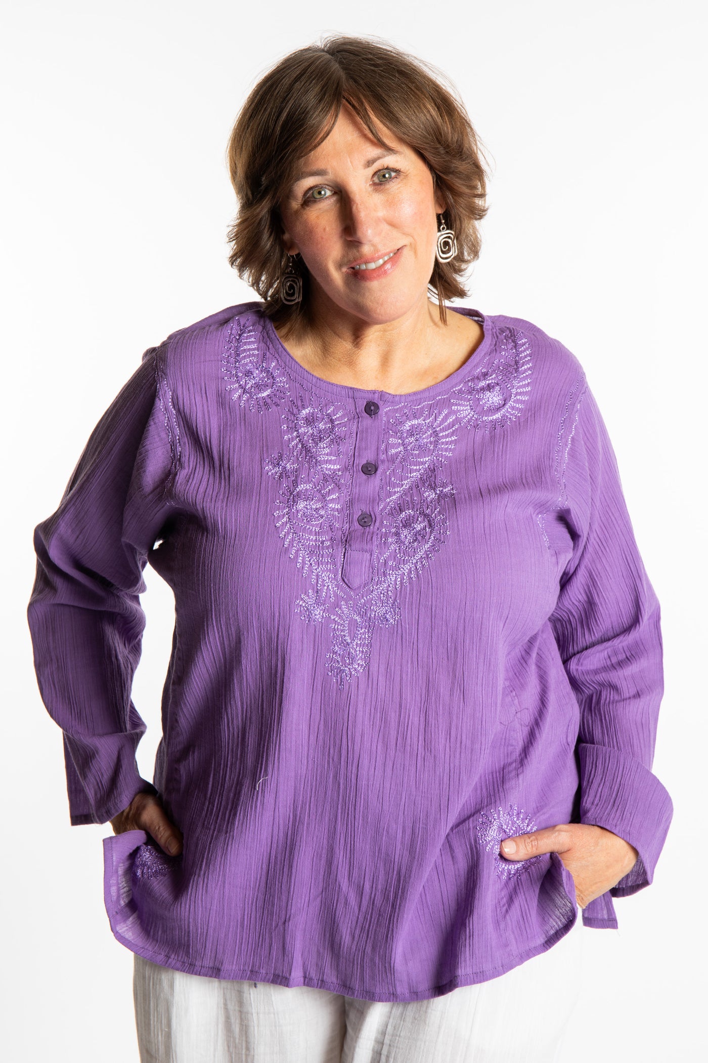 Betty is wearing a size L Purple embroidered Kurta top