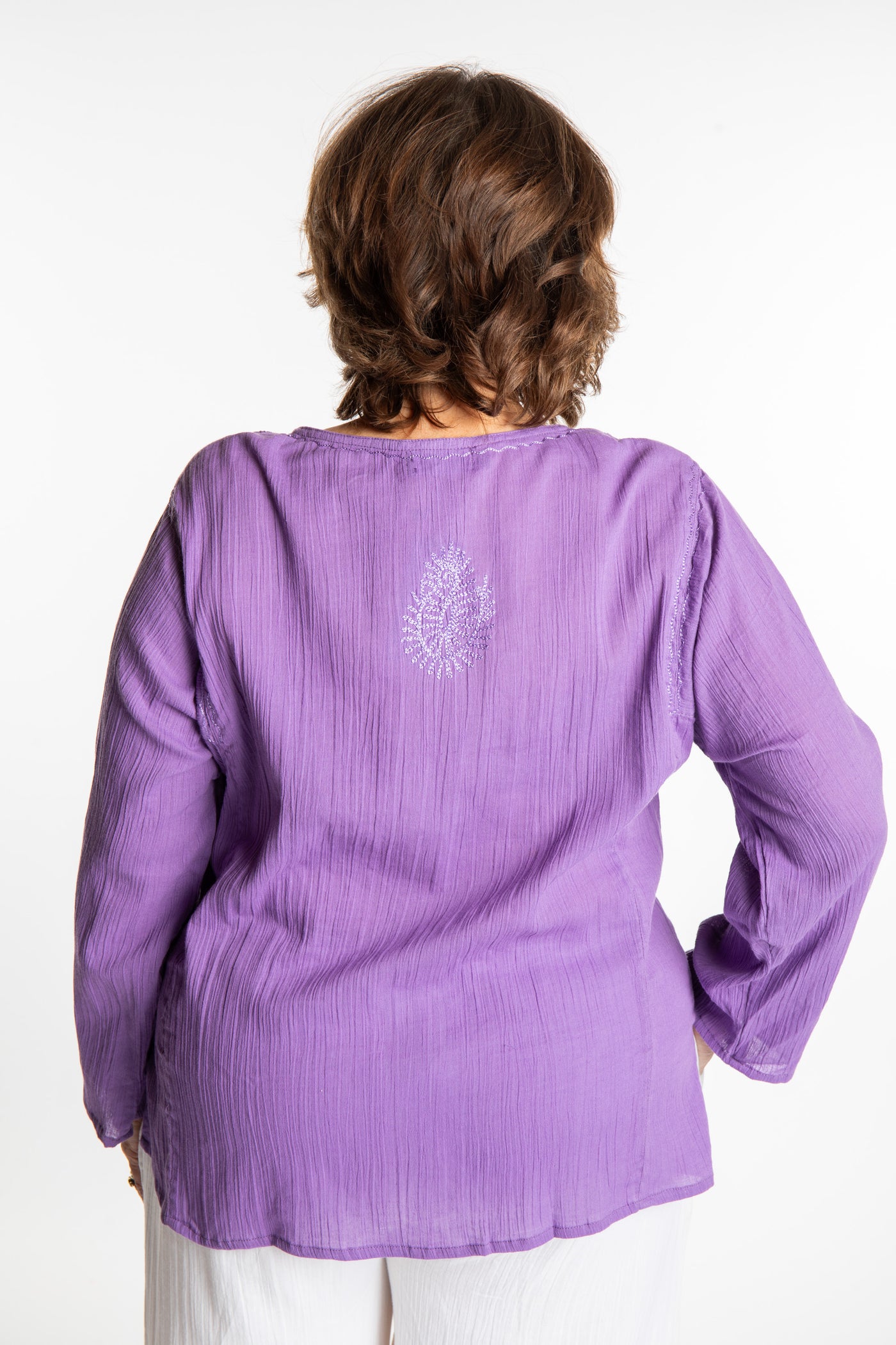 Betty is wearing a size L Purple embroidered Kurta top