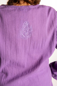 Betty is wearing a size L Purple embroidered Kurta top