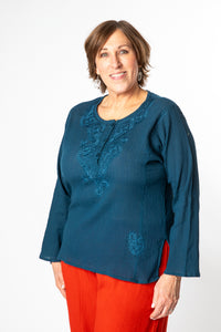 Betty is wearing size M cotton kurta in teal