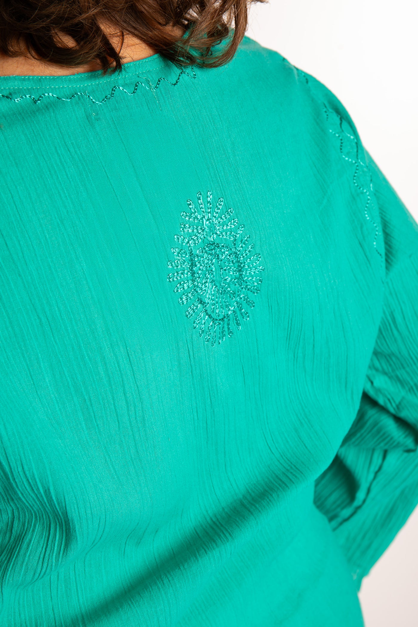 Betty is wearing a size L Turquoise embroidered Kurta top