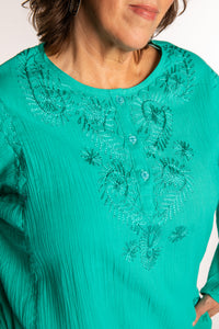 Betty is wearing a size L Turquoise embroidered Kurta top