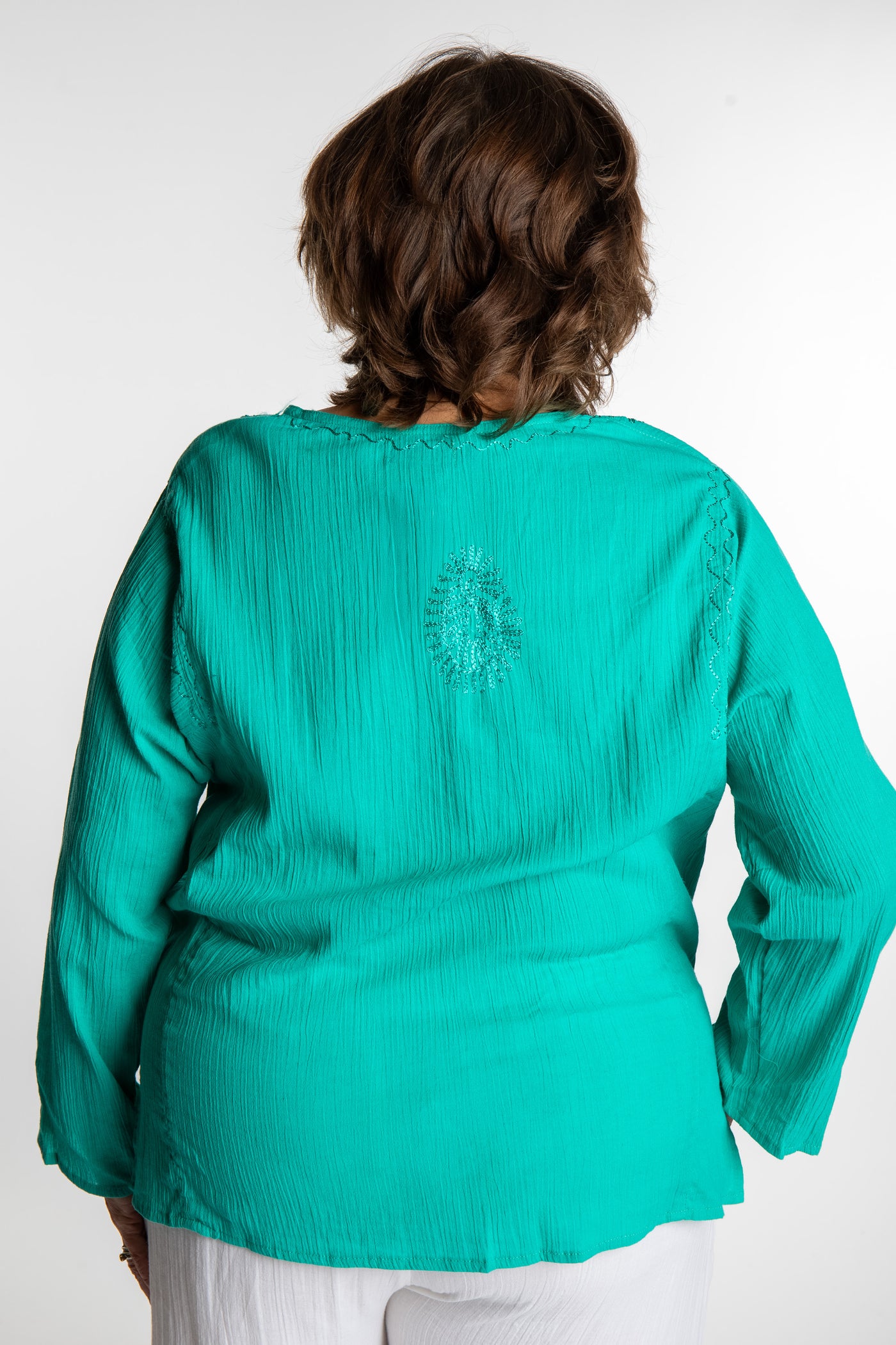 Betty is wearing a size L Turquoise embroidered Kurta top
